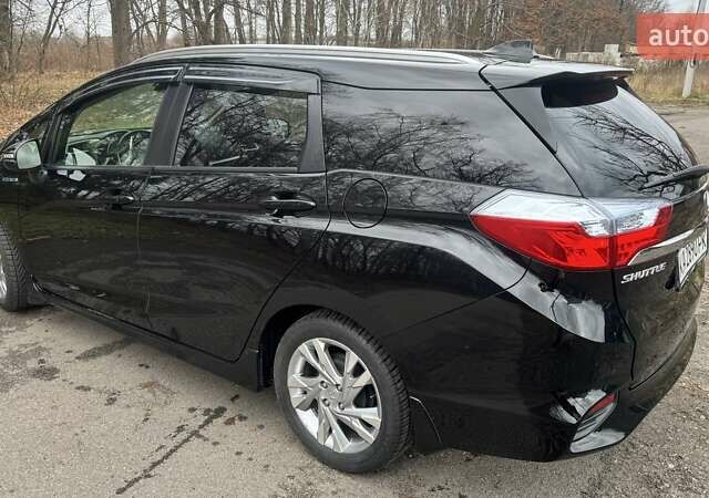 Черный Хонда Шатл, объемом двигателя 1.5 л и пробегом 60 тыс. км за 12500 $, фото 12 на Automoto.ua