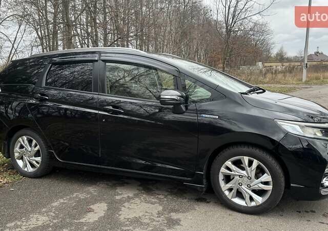 Черный Хонда Шатл, объемом двигателя 1.5 л и пробегом 60 тыс. км за 12500 $, фото 7 на Automoto.ua