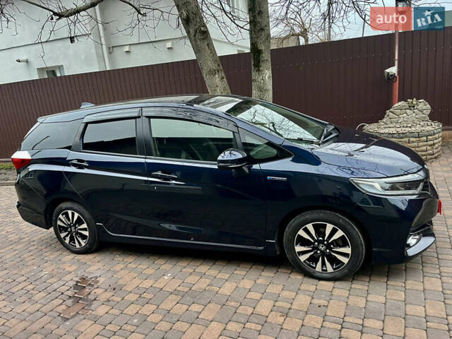 Синий Хонда Шатл, объемом двигателя 1.5 л и пробегом 53 тыс. км за 13300 $, фото 67 на Automoto.ua