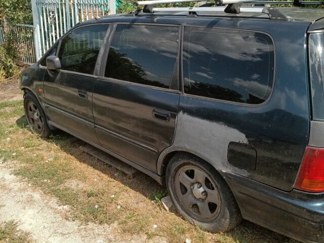 Зеленый Хонда Шатл, объемом двигателя 2.2 л и пробегом 400 тыс. км за 1500 $, фото 3 на Automoto.ua