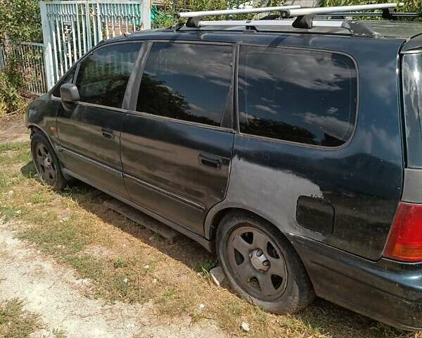 Зеленый Хонда Шатл, объемом двигателя 2.2 л и пробегом 100 тыс. км за 1500 $, фото 1 на Automoto.ua