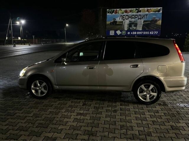 Бежевий Хонда Стрім, об'ємом двигуна 1.7 л та пробігом 260 тис. км за 3650 $, фото 4 на Automoto.ua