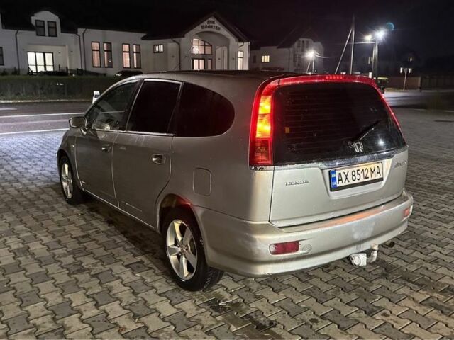 Бежевий Хонда Стрім, об'ємом двигуна 1.7 л та пробігом 260 тис. км за 3650 $, фото 3 на Automoto.ua