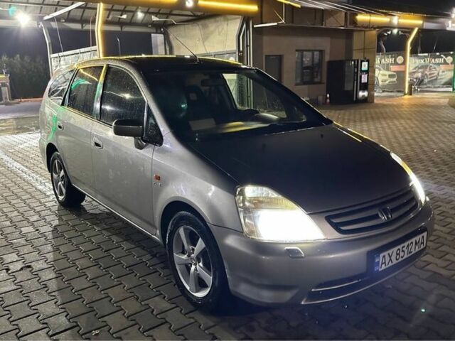 Бежевий Хонда Стрім, об'ємом двигуна 1.7 л та пробігом 260 тис. км за 3650 $, фото 1 на Automoto.ua