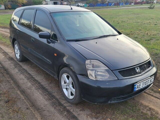 Чорний Хонда Стрім, об'ємом двигуна 1.7 л та пробігом 390 тис. км за 3900 $, фото 2 на Automoto.ua