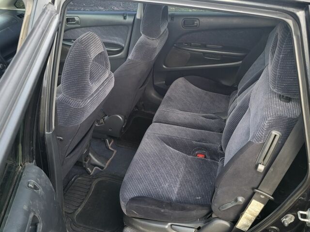 Чорний Хонда Стрім, об'ємом двигуна 1.7 л та пробігом 390 тис. км за 3900 $, фото 7 на Automoto.ua