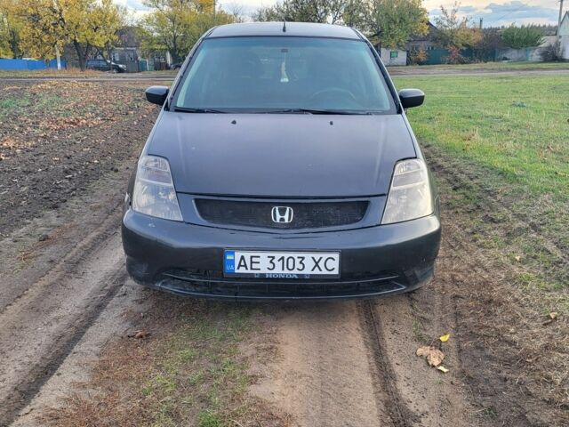 Чорний Хонда Стрім, об'ємом двигуна 1.7 л та пробігом 390 тис. км за 3900 $, фото 1 на Automoto.ua