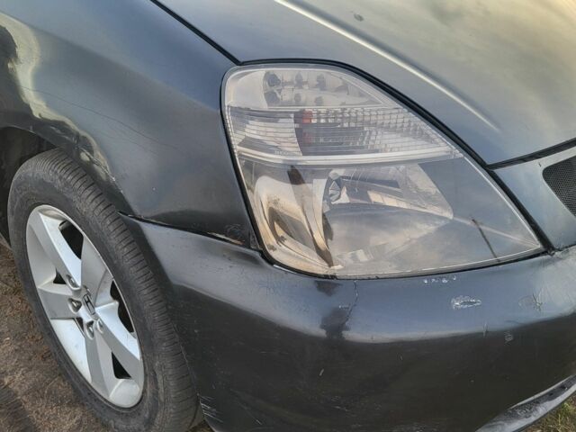 Чорний Хонда Стрім, об'ємом двигуна 1.7 л та пробігом 390 тис. км за 3900 $, фото 3 на Automoto.ua