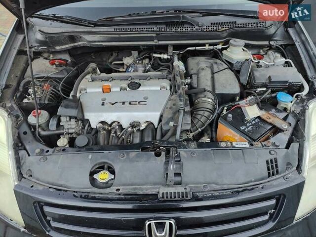 Черный Хонда Стрим, объемом двигателя 2 л и пробегом 305 тыс. км за 3800 $, фото 7 на Automoto.ua