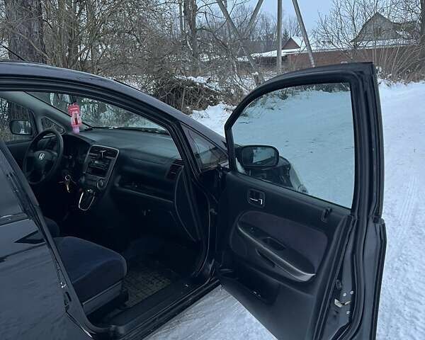 Черный Хонда Стрим, объемом двигателя 2 л и пробегом 216 тыс. км за 3800 $, фото 16 на Automoto.ua