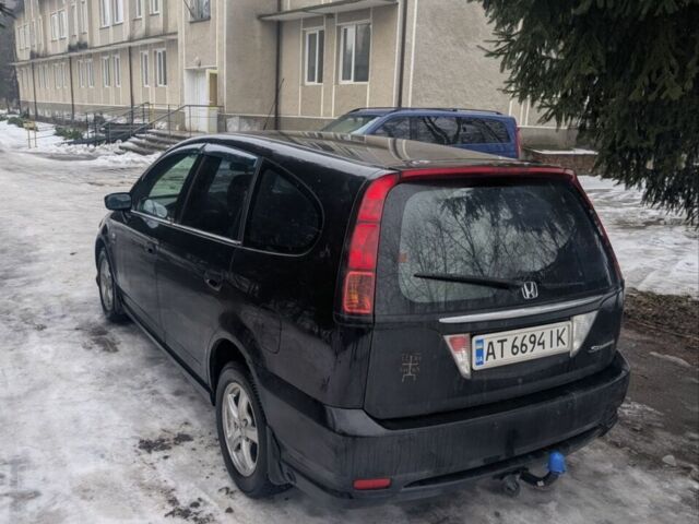 Чорний Хонда Стрім, об'ємом двигуна 2 л та пробігом 360 тис. км за 5499 $, фото 6 на Automoto.ua