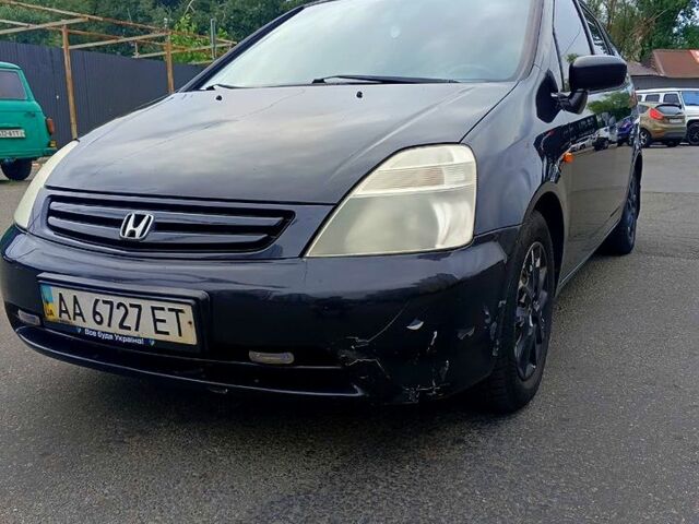 Чорний Хонда Стрім, об'ємом двигуна 1.6 л та пробігом 216 тис. км за 3500 $, фото 3 на Automoto.ua