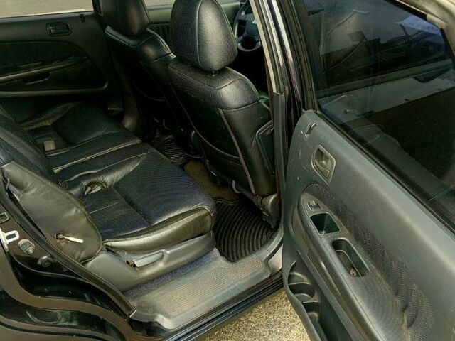 Чорний Хонда Стрім, об'ємом двигуна 1.6 л та пробігом 216 тис. км за 3500 $, фото 7 на Automoto.ua