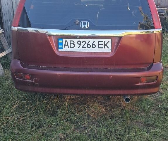 Красный Хонда Стрим, объемом двигателя 2 л и пробегом 350 тыс. км за 1460 $, фото 6 на Automoto.ua