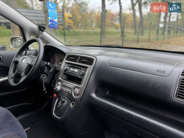 Жовтий Хонда Стрім, об'ємом двигуна 2 л та пробігом 320 тис. км за 3900 $, фото 4 на Automoto.ua