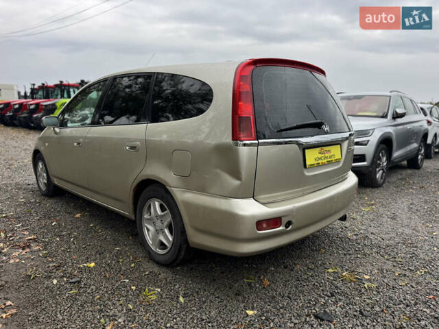 Жовтий Хонда Стрім, об'ємом двигуна 2 л та пробігом 320 тис. км за 3900 $, фото 2 на Automoto.ua