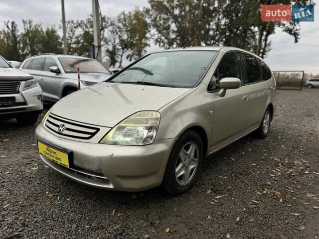 Жовтий Хонда Стрім, об'ємом двигуна 2 л та пробігом 320 тис. км за 3900 $, фото 1 на Automoto.ua