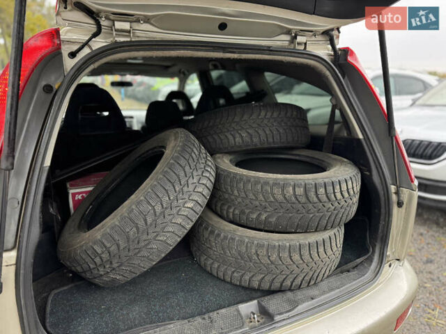 Жовтий Хонда Стрім, об'ємом двигуна 2 л та пробігом 320 тис. км за 3900 $, фото 12 на Automoto.ua