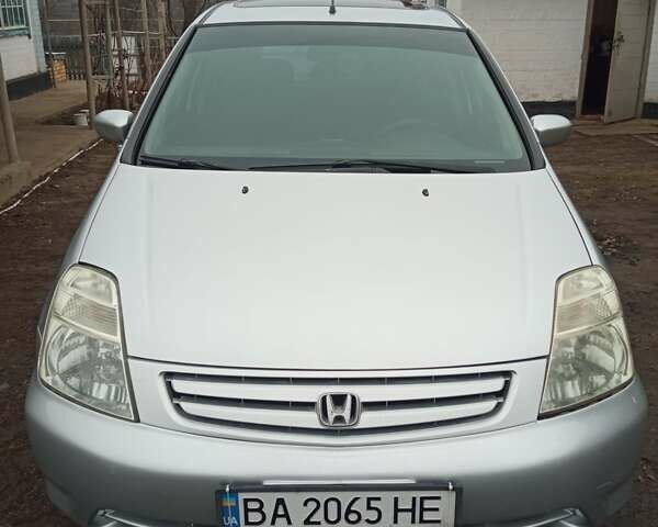 Серый Хонда Стрим, объемом двигателя 2 л и пробегом 240 тыс. км за 4350 $, фото 1 на Automoto.ua