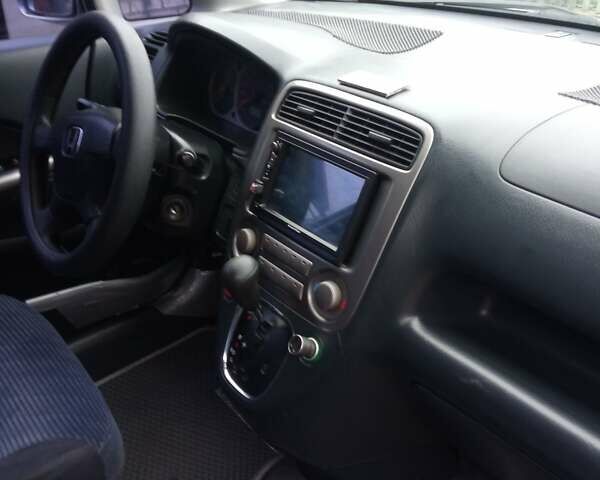 Серый Хонда Стрим, объемом двигателя 2 л и пробегом 240 тыс. км за 4350 $, фото 7 на Automoto.ua