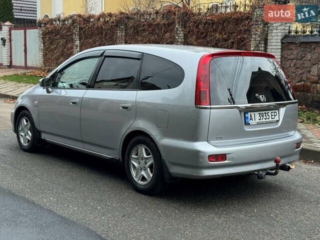 Сірий Хонда Стрім, об'ємом двигуна 2 л та пробігом 259 тис. км за 5500 $, фото 4 на Automoto.ua