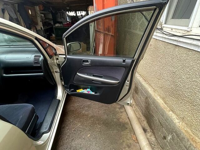 Серый Хонда Стрим, объемом двигателя 2 л и пробегом 270 тыс. км за 4900 $, фото 6 на Automoto.ua