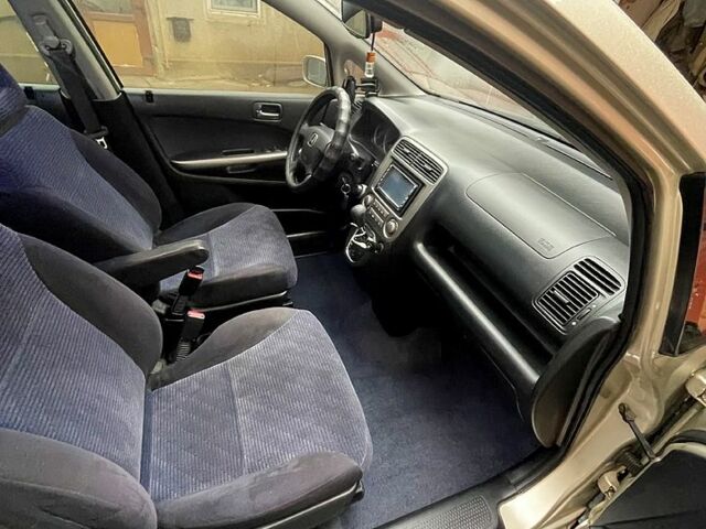 Серый Хонда Стрим, объемом двигателя 2 л и пробегом 270 тыс. км за 4900 $, фото 3 на Automoto.ua