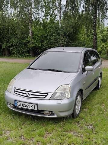 Сірий Хонда Стрім, об'ємом двигуна 2 л та пробігом 430 тис. км за 3500 $, фото 1 на Automoto.ua