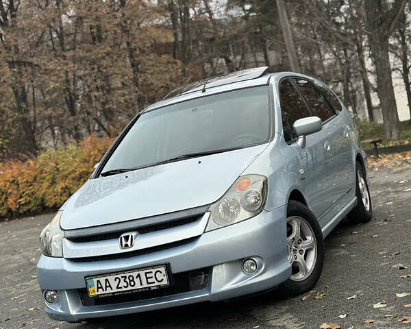 Сірий Хонда Стрім, об'ємом двигуна 2 л та пробігом 236 тис. км за 5499 $, фото 2 на Automoto.ua