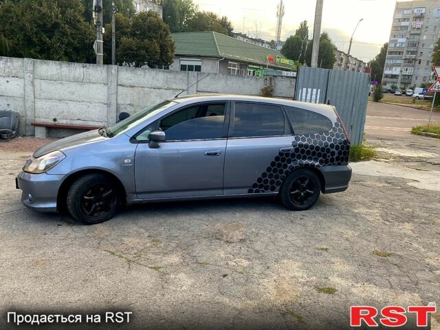 Серый Хонда Стрим, объемом двигателя 2 л и пробегом 350 тыс. км за 1850 $, фото 1 на Automoto.ua