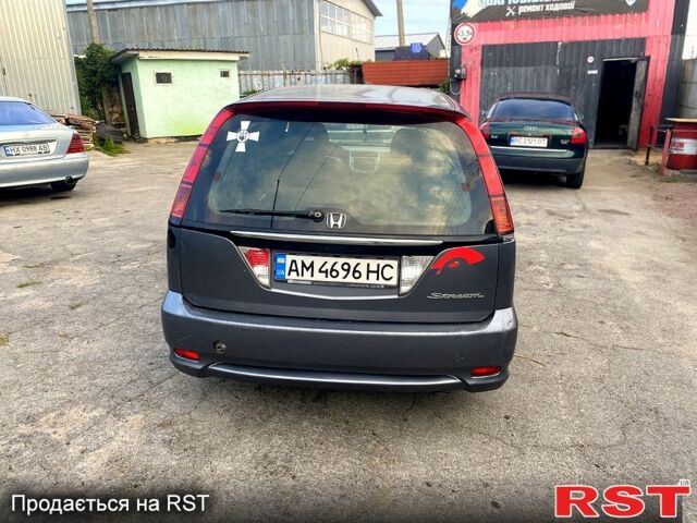 Серый Хонда Стрим, объемом двигателя 2 л и пробегом 350 тыс. км за 1850 $, фото 2 на Automoto.ua