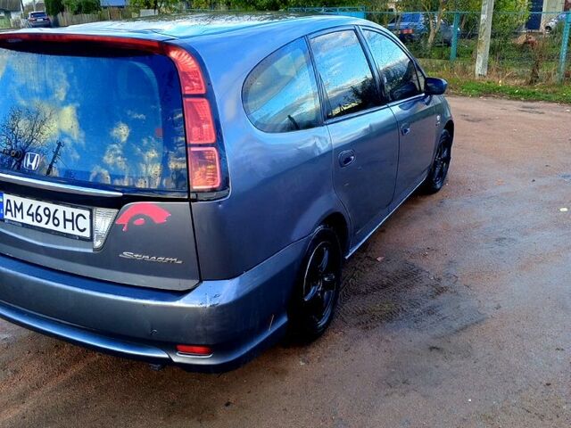 Серый Хонда Стрим, объемом двигателя 2 л и пробегом 300 тыс. км за 5000 $, фото 3 на Automoto.ua