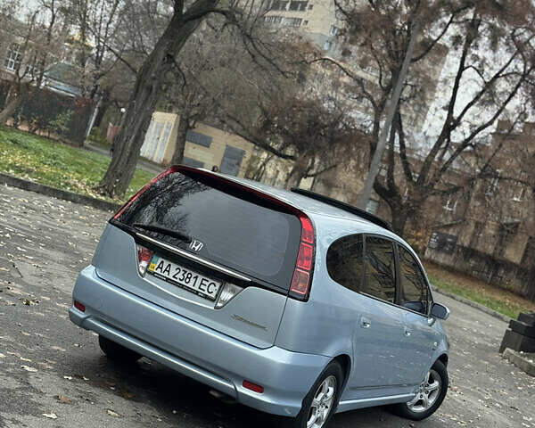 Сірий Хонда Стрім, об'ємом двигуна 2 л та пробігом 236 тис. км за 5499 $, фото 4 на Automoto.ua