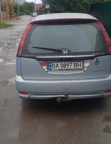 Серый Хонда Стрим, объемом двигателя 2 л и пробегом 213 тыс. км за 4100 $, фото 1 на Automoto.ua