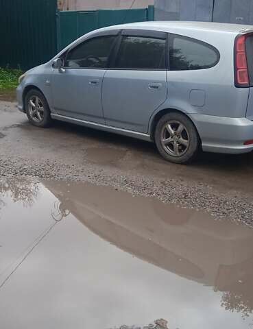 Серый Хонда Стрим, объемом двигателя 2 л и пробегом 213 тыс. км за 4100 $, фото 2 на Automoto.ua