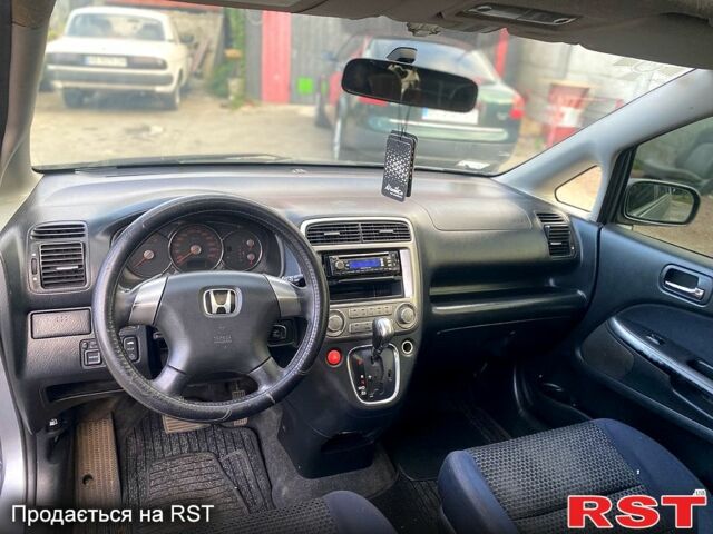 Серый Хонда Стрим, объемом двигателя 2 л и пробегом 350 тыс. км за 1850 $, фото 4 на Automoto.ua