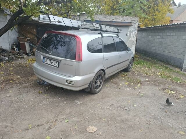 Серый Хонда Стрим, объемом двигателя 2 л и пробегом 450 тыс. км за 3650 $, фото 1 на Automoto.ua