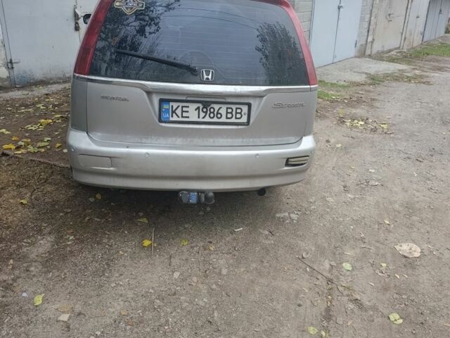 Серый Хонда Стрим, объемом двигателя 2 л и пробегом 450 тыс. км за 3650 $, фото 2 на Automoto.ua