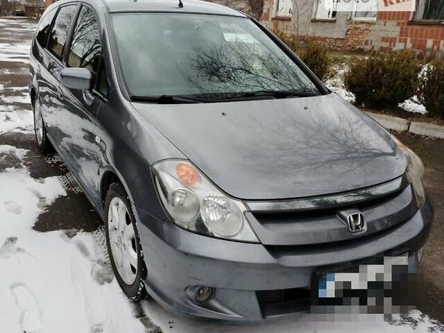 Сірий Хонда Стрім, об'ємом двигуна 2 л та пробігом 311 тис. км за 5200 $, фото 3 на Automoto.ua