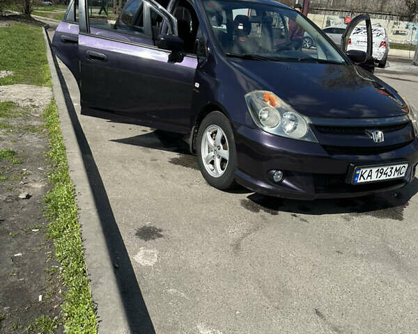 Синій Хонда Стрім, об'ємом двигуна 2 л та пробігом 193 тис. км за 6000 $, фото 24 на Automoto.ua