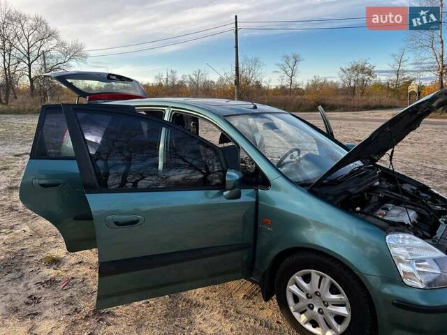 Зеленый Хонда Стрим, объемом двигателя 2 л и пробегом 145 тыс. км за 5000 $, фото 14 на Automoto.ua