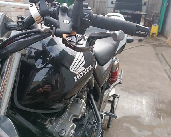 Черный Хонда CB 400SF, объемом двигателя 0.38 л и пробегом 53 тыс. км за 4000 $, фото 66 на Automoto.ua