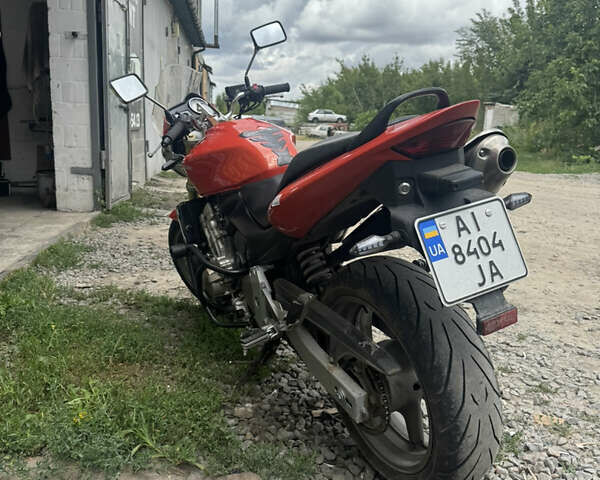 Желтый Хонда CB 600F Hornet, объемом двигателя 0.6 л и пробегом 50 тыс. км за 5500 $, фото 3 на Automoto.ua