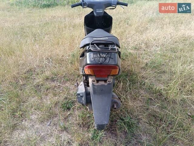 Черный Хонда Dio AF-27, объемом двигателя 0 л и пробегом 200 тыс. км за 300 $, фото 7 на Automoto.ua