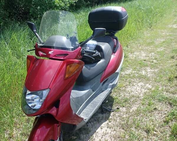 Красный Хонда Foresight 250, объемом двигателя 0.25 л и пробегом 63 тыс. км за 1000 $, фото 1 на Automoto.ua