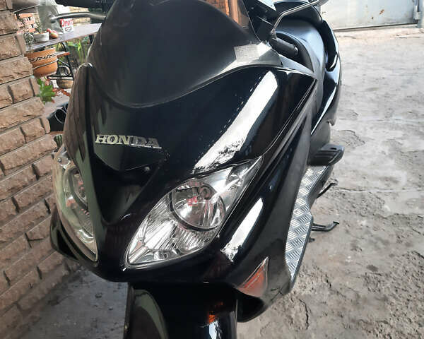 Чорний Хонда Forza 125, об'ємом двигуна 0.25 л та пробігом 0 тис. км за 2600 $, фото 3 на Automoto.ua