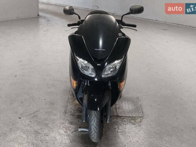 Черный Хонда Forza 250, объемом двигателя 0.25 л и пробегом 17 тыс. км за 2100 $, фото 4 на Automoto.ua