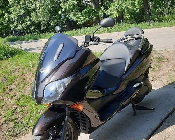 Коричневый Хонда Forza 250, объемом двигателя 0.25 л и пробегом 27 тыс. км за 2200 $, фото 1 на Automoto.ua