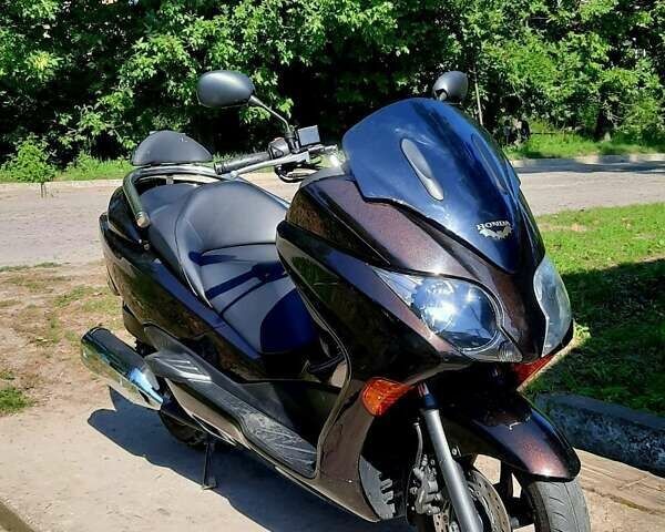Коричневый Хонда Forza 250, объемом двигателя 0.25 л и пробегом 27 тыс. км за 2200 $, фото 3 на Automoto.ua