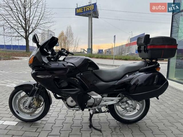 Фиолетовый Хонда NT 650V Deauville, объемом двигателя 0.65 л и пробегом 38 тыс. км за 3499 $, фото 5 на Automoto.ua